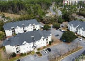 Thumbnail 5 of 31 - an aerial view of houses in a neighborhood at The Fountains Apartments, Pensacola, Florida, 32514
